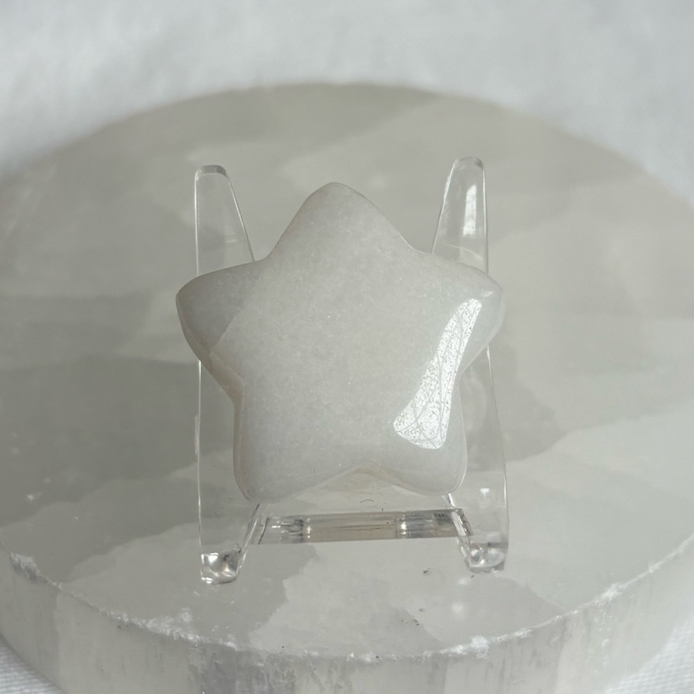 Milky quartz crystal star carving